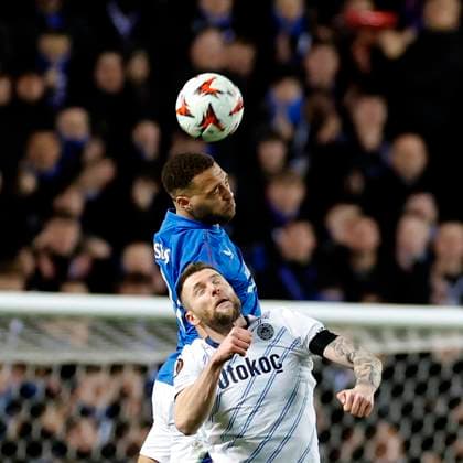 Rangers v Fenerbahce S.K. UEFA Europa League Cyriel Dessers of Rangers wins a header against Milan Å kriniar of Fenerbahce S.K. during the UEFA Europa League Round of 16 Second Leg match at Ibrox Stadium, Glasgow UK Newspapers OUT Copyright: xFredxPalmerx FIL-21575-0087