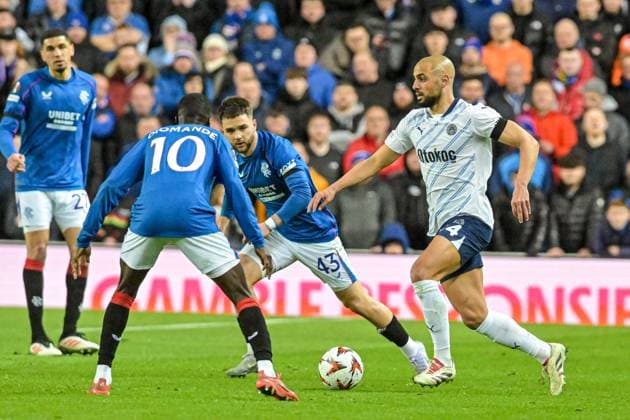 Rangers v Fenerbahce S.K. UEFA Europa League Mohammed Diomande of Rangers and Sofyan Amrabat of Fenerbahce S.K. during the UEFA Europa League Round of 16 Second Leg match at Ibrox Stadium, Glasgow UK Newspapers OUT Copyright: xJamiexJohnstonx FIL-21576-0024