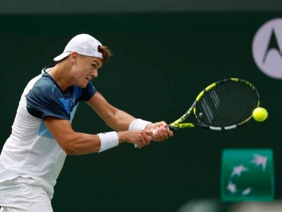 March 13, 2025 Holger Rune (DEN) returns a shot against Tallon Griekspoor (NED) during the 2025 BNP Paribas Open at Indian Wells Tennis Garden in Indian Wells, California. Mandatory Photo Credit: CSM Indian Wells United States of America - ZUMAc04_ 20250313_zma_c04_185 Copyright: xCharlesxBausx