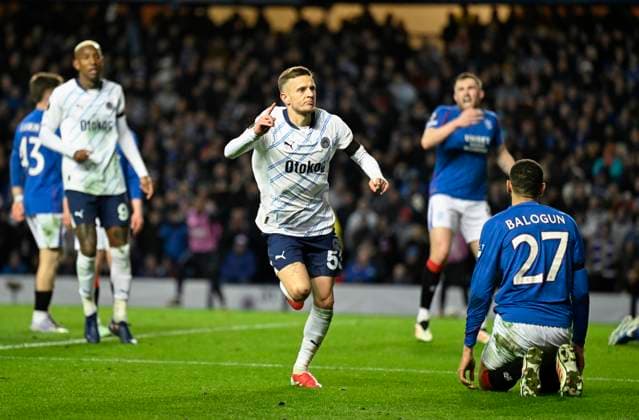Glasgow, Scotland, 13th March 2025. Sebastian Szymanski of Fenerbahce scores his 2nd goal during the UEFA Europa League match Rangers v Fenerbahce at Ibrox Stadium, Glasgow. Picture credit should read: Neil Hanna Sportimage EDITORIAL USE ONLY. No use with unauthorised audio, video, data, fixture lists, club league logos or live services. Online in-match use limited to 120 images, no video emulation. No use in betting, games or single club league player publications. SPI_015_NH_Rangers_Fenerbahc__e SPI-3743-0015