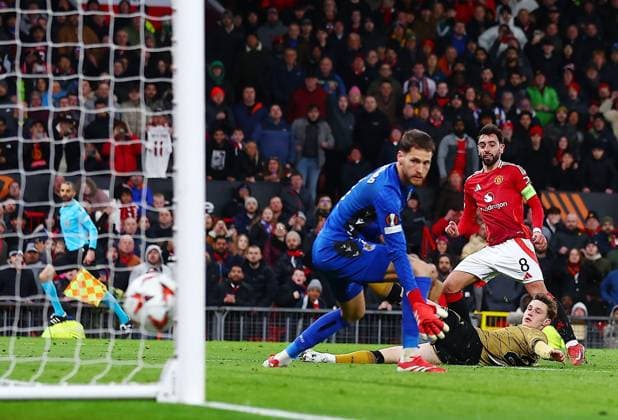 Bruno Fernandes of Manchester United, ManU scores a goal to make it 3-1 Manchester United v Real Sociedad, UEFA Europa League, Round of 16, Second Leg, Football, Old Trafford, Manchester, UK - 13 Mar 2025 EDITORIAL USE ONLY No use with unauthorised audio, video, data, fixture lists, club league logos or live services. Online in-match use limited to 120 images, no video emulation. No use in betting, games or single club league player publications. Copyright: xMattxWest Shutterstockx 15188208as