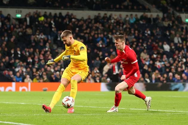 13th March 2025; Tottenham Hotspur Stadium, London, England; UEFA Europa League Last 16 Second Leg Football, Tottenham Hotspur versus AZ Alkmaar; goalkeeper Guglielmo Vicario of Tottenham Hotspur faces his own goal after being caught with the ball by Peer Koopmeiners of AZ Alkmaar  ActionPlus12759990 KatiexChan
