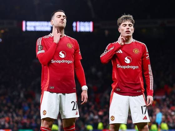 Diogo Dalot of Manchester United, ManU celebrates scoring a goal to make it 4-1 with Alejandro Garnacho Manchester United v Real Sociedad, UEFA Europa League, Round of 16, Second Leg, Football, Old Trafford, Manchester, UK - 13 Mar 2025 EDITORIAL USE ONLY No use with unauthorised audio, video, data, fixture lists, club league logos or live services. Online in-match use limited to 120 images, no video emulation. No use in betting, games or single club league player publications. Copyright: xMattxWest Shutterstockx 15188208ay