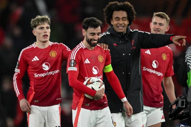 UEFA Europa League Last 16 Manchester United, ManU v Real Sociedad Bruno Fernandes of Manchester United collects the match ball after scoring a hat-trick during the UEFA Europa League Last 16 match Manchester United vs Real Sociedad at Old Trafford, Manchester, United Kingdom, 13th March 2025 (Photo by Craig Thomas News Images) Manchester Old Trafford Greater Manchester United Kingdom Copyright: xCraigxThomas NewsxImagesx