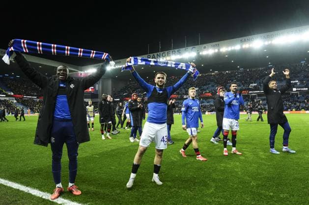Nicolas Raskin of Rangers holds a scarf at full-time Rangers v Fenerbahce, UEFA Europa League, Round of 16, Second Leg, Football, Ibrox Stadium, Glasgow, Scotland, UK - 13 Mar 2025 EDITORIAL USE ONLY No use with unauthorised audio, video, data, fixture lists, club league logos or live services. Online in-match use limited to 120 images, no video emulation. No use in betting, games or single club league player publications. Copyright: xStuartxWallace Shutterstockx 15188226eg