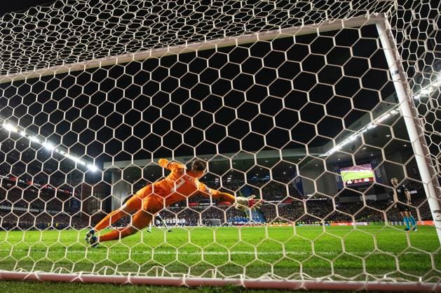 Rangers goalkeeper Jack Butland saves Fred of Fenerbahce s penalty during the Europa League last 16 match at Ibrox Stadium, Glasgow. Rangers v Fenerbahce, UEFA Europa League, Round of 16, Second Leg, Football, Ibrox Stadium, Glasgow, Scotland, UK - 13 Mar 2025 EDITORIAL USE ONLY No use with unauthorised audio, video, data, fixture lists, club league logos or live services. Online in-match use limited to 120 images, no video emulation. No use in betting, games or single club league player publications. Copyright: xO Rourke RangersxFC Shutterstockx 15196580bl