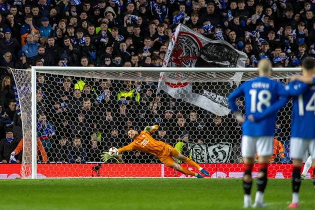 Rangers v Fenerbahce Europa League 13 03 2025. Jack Butland of Rangers FC dives down to his right and saves a penalty during the Europa League 1 4 Final 2nd leg, Rangers vs Fenerbahce at Ibrox Stadium, Glasgow,Scotland, 13 03 2025. Govan Ibrox Stadium Glasgow Scotland Editorial use only , Copyright: xColinxPoultneyx PSI-21628-0060