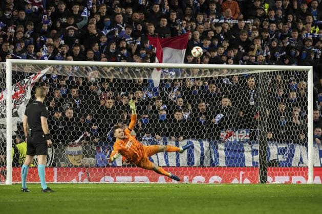 Rangers win the penalty shootout as Mert Hakan Yandas of Fenerbahce SK fails to score their penalty Rangers v Fenerbahce, UEFA Europa League, Round of 16, Second Leg, Football, Ibrox Stadium, Glasgow, Scotland, UK - 13 Mar 2025 EDITORIAL USE ONLY No use with unauthorised audio, video, data, fixture lists, club league logos or live services. Online in-match use limited to 120 images, no video emulation. No use in betting, games or single club league player publications. Copyright: xStuartxWallace Shutterstockx 15188226ek