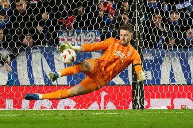 Jack Butland of Rangers saves the opening penalty from Dusan Tadic of Fenerbahce SK Rangers v Fenerbahce, UEFA Europa League, Round of 16, Second Leg, Football, Ibrox Stadium, Glasgow, Scotland, UK - 13 Mar 2025 EDITORIAL USE ONLY No use with unauthorised audio, video, data, fixture lists, club league logos or live services. Online in-match use limited to 120 images, no video emulation. No use in betting, games or single club league player publications. Copyright: xStuartxWallace Shutterstockx 15188226ex