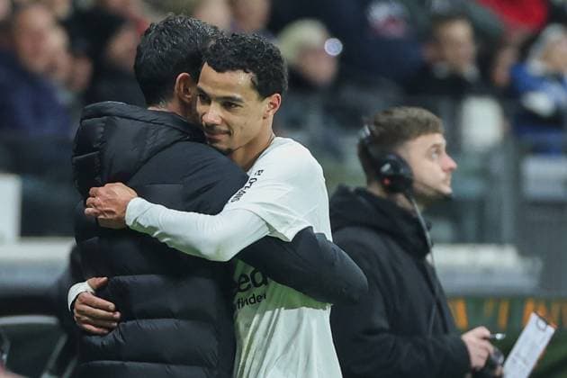 UEFA Europa League Eintracht Frankfurt Ajax Amsterdam on 13 03 2025 at Deutsche Bank Park in Frankfurt Coach Dino Toppmöller Toppmoeller Toppmoller Frankfurt and Hugo Ekitike Frankfurt 11 hug each other MH