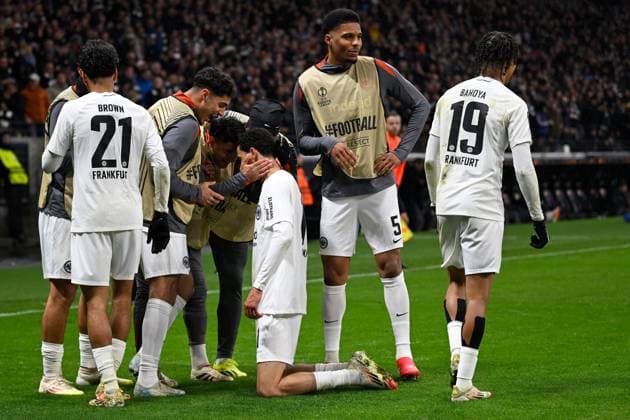 (250314) -- FRANKFURT, March 14, 2025 -- Hugo Ekitike (C) of Eintracht Frankfurt celebrates scoring with teammates during the UEFA Europa League Round of 16 2nd leg match between Eintracht Frankfurt and AFC Ajax in Frankfurt, Germany, March 13, 2025. (Photo by Xinhua) (SP)GERMANY-FRANKFURT-FOOTBALL-UEFA EUROPA LEAGUE-FRANKFURT VS AJAX UlrichxHufnagel 