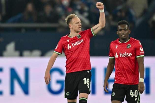 Havard Nielsen Hannover 16 cheers after scoring 1 2 with Rabbi Matondo Hannover 40 14 03 2025 Soccer FC Schalke 04 vs Hannover 96, Veltins Arena, Gelsenkirchen, DFB DFL REGULATIONS PROHIBIT ANY USE OF PHOTOGRAPHS AS IMAGE SEQUENCES AND OR QUASI VIDEO Copyright: xpepphotox xHorstxMauelshagenx pep00321, pep_20250314_hm_1406