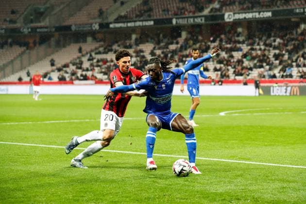 OGC Nice v AJ Auxerre - Ligue 1 McDonald s 2024 2025 14 Gideon MENSAH (aja) - 20 Tom LOUCHET (ogcn) during the Ligue 1 MacDonald s match between Nice and Auxerre at Allianz Riviera on March 14, 2025 in Nice, France. Nice France  Copyright: xFEPx 776296010