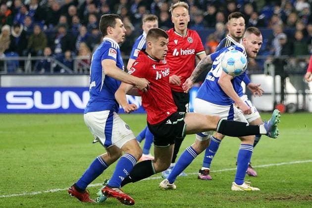 14 03 2025, xrekx, Soccer 2 Bundesliga, FC Schalke 04 Hannover 96 v l Ron Schallenberg FC Schalke 04 NicolÃ² Tresoldi Hannover 96 with the goal chance Havard Nielsen Hannover 96 Tomas Kalas FC Schalke 04 DFL DFB REGULATIONS PROHIBIT ANY USE OF PHOTOGRAPHS as IMAGE SEQUENCES and or QUASI VIDEO Gelsenkirchen