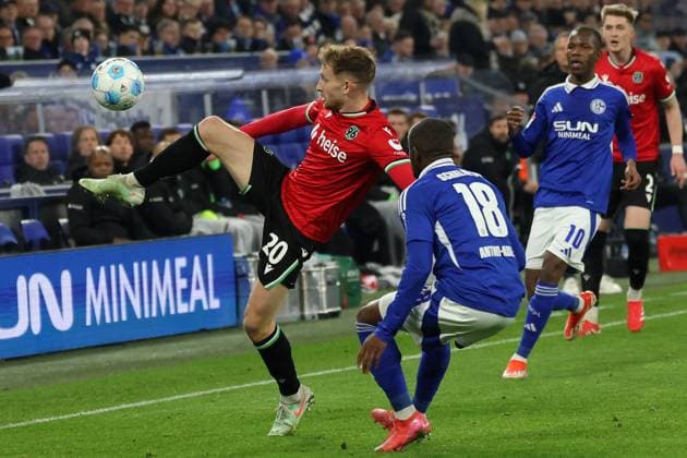 Soccer, 2 Bundesliga FC Schalke 04 Hannover 96, Matchday 26, Veltins Arena, Jannik Dehm Hannover 96 and Christopher Antwi Adjei FC Schalke 04 in a duel, DFB DFL REGULATIONS PROHIBIT ANY USE OF PHOTOGRAPHS AS IMAGE SEQUENCES AND OR QUASI VIDEO Copyright: JoachimxBywaletz xJB-Sportfoto
