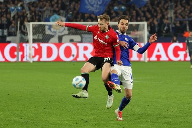Soccer, 2 Bundesliga FC Schalke 04 Hannover 96, Matchday 26, Veltins Arena, Jannik Dehm Hannover 96 and Kenan Karaman FC Schalke 04 in a duel, DFB DFL REGULATIONS PROHIBIT ANY USE OF PHOTOGRAPHS AS IMAGE SEQUENCES AND OR QUASI VIDEO Copyright: JoachimxBywaletz xJB-Sportfoto