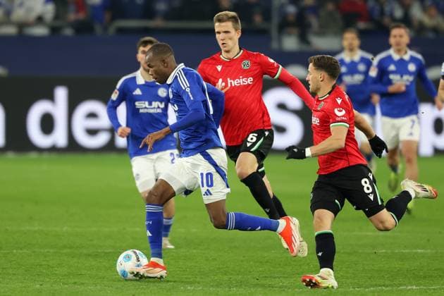 Soccer, 2 Bundesliga FC Schalke 04 Hannover 96, Matchday 26, Veltins Arena, Pape Meissa Ba FC Schalke 04 and Enzo Leopold Hannover 96 in a duel, DFB DFL REGULATIONS PROHIBIT ANY USE OF PHOTOGRAPHS AS IMAGE SEQUENCES AND OR QUASI VIDEO Copyright: JoachimxBywaletz xJB-Sportfoto