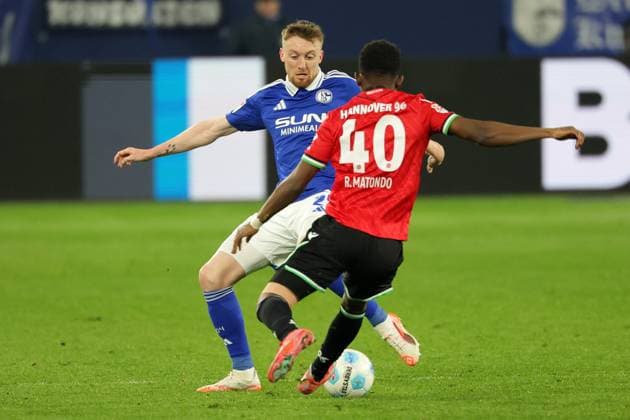 Soccer, 2 Bundesliga FC Schalke 04 Hannover 96, Matchday 26, Veltins Arena, Tobias Mohr FC Schalke 04 and Rabbi Matondo Hannover 96 in a duel, DFB DFL REGULATIONS PROHIBIT ANY USE OF PHOTOGRAPHS AS IMAGE SEQUENCES AND OR QUASI VIDEO Copyright: JoachimxBywaletz xJB-Sportfoto