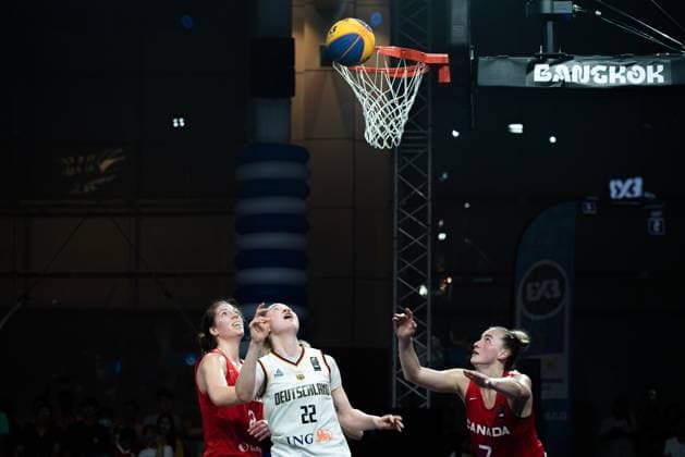 March 14, 2025, Bangkok, Thailand: Amelie Kröner 22 of Germany , Katherine Plouffe (L) and Paige Crozon (R) of Canada seen in action during the women s FIBA Basketball 3x3 Champions Cup 2025 match between Germany and Canada at Central World. Final score; Germany 10 : 14 Canada. Bangkok Thailand - ZUMAs197 20250314_aaa_s197_321 Copyright: xPeeraponxBoonyakiatx