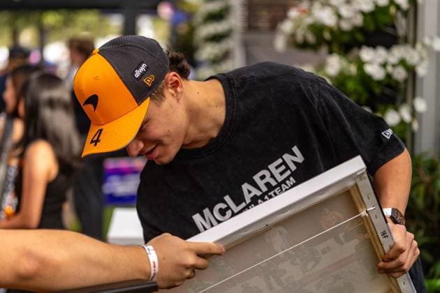 March 15, 2025, Melbourne, Victoria, Australia: McLaren Formula 1 Team driver LANDO NORRIS of the United Kingdom signs autographs in the paddock on Saturday at the Formula 1 Louis Vuitton Australian Grand Prix 2025 on March 15, 2025 in Melbourne, Australia. Melbourne Australia - ZUMAf186 20250315_zsp_f186_027 Copyright: xJamesxForresterx
