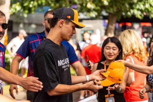 March 15, 2025, Melbourne, Victoria, Australia: McLaren Formula 1 Team driver LANDO NORRIS of the United Kingdom signs autographs in the paddock on Saturday at the Formula 1 Louis Vuitton Australian Grand Prix 2025 on March 15, 2025 in Melbourne, Australia. Melbourne Australia - ZUMAf186 20250315_zsp_f186_032 Copyright: xJamesxForresterx