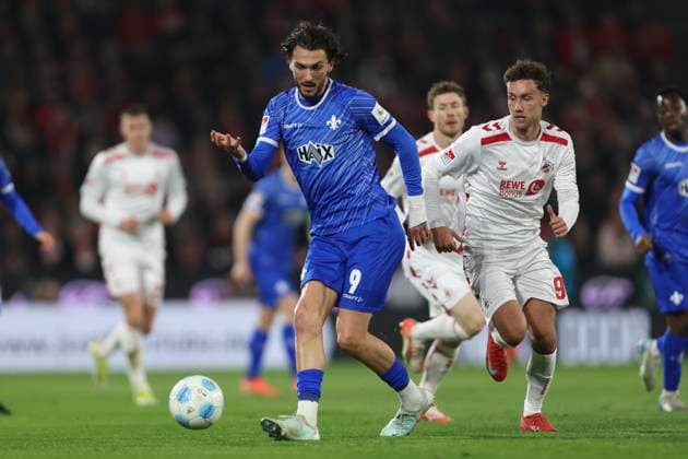 Fraser Hornby SV Darmstadt 98 and Luca Waldschmidt 1 FC Koeln battle for the ball during the 2 Bundesliga match between 1 FC Köln and SV Darmstadt 98 at RheinEnergieStadion on March 15, 2025 in Cologne, Germany, Germany Photo by Oliver Kaelke DeFodi Images Fraser Hornby SV Darmstadt 98 and Luca Waldschmidt 1 FC Koeln battle for the ball during the 2 Bundesliga match between 1 FC Köln and SV Darmstadt 98 at RheinEnergieStadion on March 15, 2025 in Cologne, Germany Photo by Oliver Kaelke DeFodi Images DFB DFL REGULATIONS PROHIBIT ANY USE OF PHOTOGRAPHS AS IMAGE SEQUENCES AND OR QUASI VIDEO Photo by Oliver Kaelke DeFodi Images