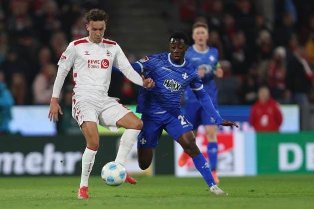 Luca Waldschmidt 1 FC Koeln and Merveille Papela SV Darmstadt 98 battle for the ball during the 2 Bundesliga match between 1 FC Koeln and SV Darmstadt 98 at RheinEnergieStadion on March 15, 2025 in Cologne, Germany, Germany Photo by Oliver Kaelke DeFodi Images Luca Waldschmidt 1 FC Koeln and Merveille Papela SV Darmstadt 98 battle for the ball during the 2 Bundesliga match between 1 FC Köln and SV Darmstadt 98 at RheinEnergieStadion on March 15, 2025 in Cologne, Germany Photo by Oliver Kaelke DeFodi Images DFB DFL REGULATIONS PROHIBIT ANY USE OF PHOTOGRAPHS AS IMAGE SEQUENCES AND OR QUASI VIDEO Photo by Oliver Kaelke DeFodi Images