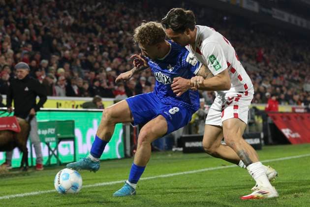 Luca Marseiler SV Darmstadt 98 and Max Finkgraefe 1 FC Koeln battle for the ball during the 2 Bundesliga match between 1 FC Köln and SV Darmstadt 98 at RheinEnergieStadion on March 15, 2025 in Cologne, Germany, Germany Photo by Oliver Kaelke DeFodi Images Luca Marseiler SV Darmstadt 98 and Max Finkgraefe 1 FC Koeln battle for the ball during the 2 Bundesliga match between 1 FC Köln and SV Darmstadt 98 at RheinEnergieStadion on March 15, 2025 in Cologne, Germany Photo by Oliver Kaelke DeFodi Images DFB DFL REGULATIONS PROHIBIT ANY USE OF PHOTOGRAPHS AS IMAGE SEQUENCES AND OR QUASI VIDEO Photo by Oliver Kaelke DeFodi Images