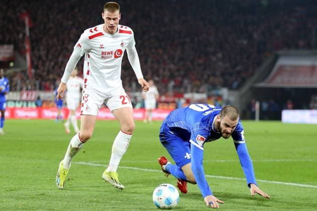 15 03 2025, xrekx, Fußball 2 Bundesliga, 1 FC Koeln SV Darmstadt 98 v l Steffen Tigges 1 FC Koeln Aleksandar Vukotic SV Darmstadt 98 Zweikampf, Aktion, action, battle for the ball DFL DFB REGULATIONS PROHIBIT ANY USE OF PHOTOGRAPHS as IMAGE SEQUENCES and or QUASI VIDEO Koeln