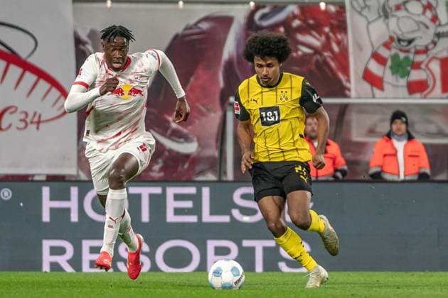 Leipzig, Germany 15 March 2025 1 BL 2024 2025 RB Leipzig vs Borussia Dortmund Pictured from left in duel El Chadaille Bitshiabu Leipzig and Karim Adeyemi Dortmund DFL regulations prohibit any use of photographs as image sequences and or quasi video Copyright: xFotostandx xNachtigallx