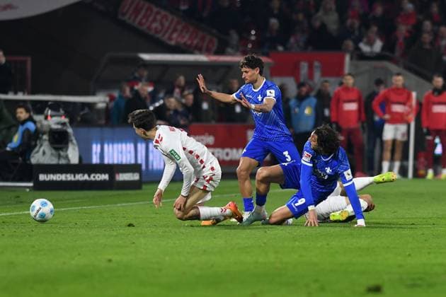 Denis Huseinbasic 1 FC Koeln and Fraser Hornby SV Darmstadt 98 in a duel during the 2 Bundesliga match between 1 FC Köln and SV Darmstadt 98 at RheinEnergieStadion on March 15, 2025 in Cologne, Germany, Germany Photo by Ralf Treese DeFodi Images Denis Huseinbasic 1 FC Koeln and Fraser Hornby SV Darmstadt 98 battle for the ball during the 2 Bundesliga match between 1 FC Köln and SV Darmstadt 98 at RheinEnergieStadion on March 15, 2025 in Cologne, Germany Photo by Ralf Treese DeFodi Images DFB DFL REGULATIONS PROHIBIT ANY USE OF PHOTOGRAPHS AS IMAGE SEQUENCES AND OR QUASI VIDEO Photo by Ralf Treese DeFodi Images