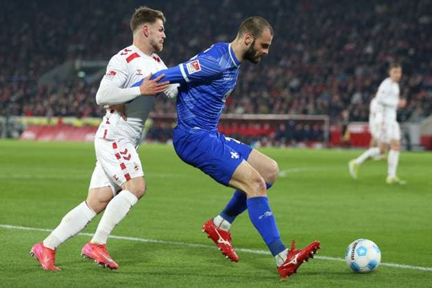 15 03 2025, xrekx, Fußball 2 Bundesliga, 1 FC Koeln SV Darmstadt 98 v l Jan Thielmann 1 FC Koeln Aleksandar Vukotic SV Darmstadt 98 Zweikampf, Aktion, action, battle for the ball DFL DFB REGULATIONS PROHIBIT ANY USE OF PHOTOGRAPHS as IMAGE SEQUENCES and or QUASI VIDEO Koeln