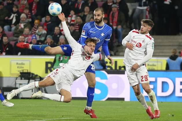 15 03 2025, xrekx, Fußball 2 Bundesliga, 1 FC Koeln SV Darmstadt 98 v l Timo Hübers Huebers 1 FC Koeln Aleksandar Vukotic SV Darmstadt 98 Zweikampf, Aktion, action, battle for the ball Jan Thielmann 1 FC Koeln DFL DFB DFB REGULATIONS PROHIBIT ANY USE OF PHOTOGRAPHS as IMAGE SEQUENCES and or QUASI VIDEO Koeln