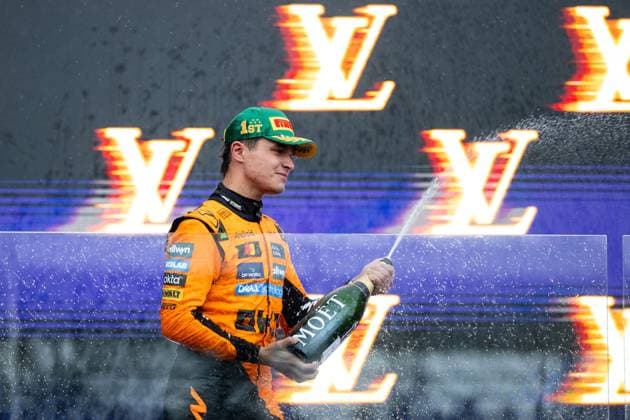 Lando Norris McLaren Formula 1 Team, 04 celebrates victory with champagne on the podium at the podium ceremony, AUS, Formula 1 World Championship, Luis Vuitton Australian Grand Prix, Albert Park Circuit Melbourne, Race, 2025 season, 16 03 2025 AUS, Formula 1 World Championship, Luis Vuitton Australian Grand Prix, Albert Park Circuit Melbourne, Race, 2025 season, 16 03 2025 Melbourne Copyright: xEibner-Pressefoto Memmlerx EP_MMR