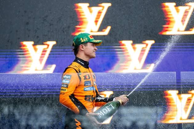 Lando Norris McLaren Formula 1 Team, 04 celebrates victory with champagne on the podium at the podium ceremony, AUS, Formula 1 World Championship, Luis Vuitton Australian Grand Prix, Albert Park Circuit Melbourne, Race, 2025 season, 16 03 2025 AUS, Formula 1 World Championship, Luis Vuitton Australian Grand Prix, Albert Park Circuit Melbourne, Race, 2025 season, 16 03 2025 Melbourne Copyright: xEibner-Pressefoto Memmlerx EP_MMR