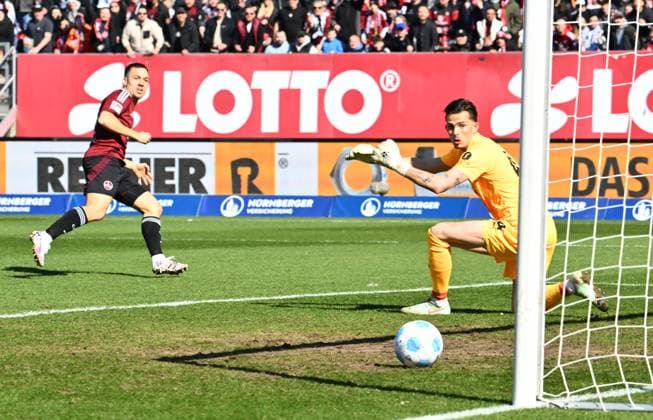 16 03 2025 Soccer season 2024 2025 2 Soccer Bundesliga 26 Matchday 1 FC Nürnberg FCN Club SpVgg Greuther Fürth Kleeblatt Derby Frankenderby Sportfoto Zink xwoxzix DFL regulations prohibit any use of photographs as image sequences and or quasi video only for editorial use Julian Justvan 10, 1 FC Nürnberg FCN scores goal Goal shot for 1 0 against Nahuel Noll 44, SpVgg Greuther Fürth
