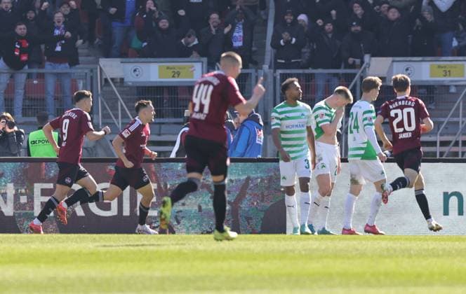 16 03 2025 Soccer Season 2024 2025 2 Soccer Bundesliga 26 Matchday 1 FC Nürnberg FCN Club SpVgg Greuther Fürth Kleeblatt Derby Frankenderby Sportfoto Zink DaMa xdaxmax DFL regulations prohibit any use of photographs as image sequences and or quasi video only for editorial use Jubel Freude Torjubel nach Tor zum 2 0 Julian Justvan 10, 1 FC Nürnberg FCN und Mannschaft Team jubelt freut sich Torschütze Julian Justvan 10, 1 FC Nürnberg FCN