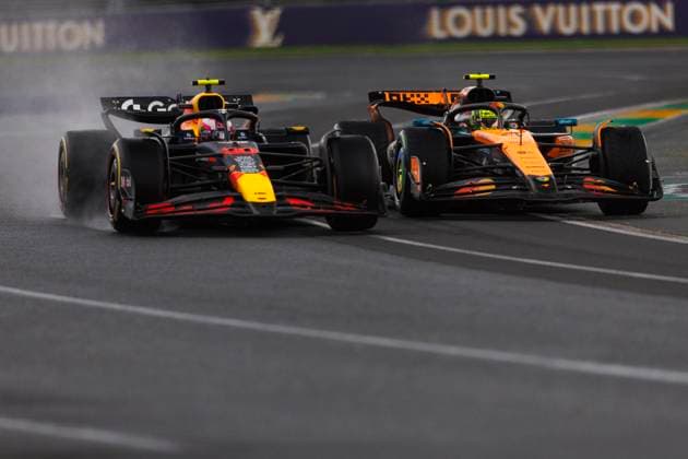 16th March 2025; Melbourne Grand Prix Circuit, Melbourne, Victoria, Australia; Australian Formula 1 Grand Prix; Race Day; Liam Lawson, Lando Norris in wet conditions during the race  ActionPlus12762241 StephenxBlackberry