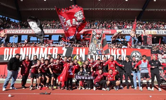 16 03 2025 Soccer Season 2024 2025 2 Soccer Bundesliga 26 Matchday 1 FC Nürnberg FCN Club SpVgg Greuther Fürth Kleeblatt Derby Frankenderby Sportfoto Zink DaMa xdaxmax DFL regulations prohibit any use of photographs as image sequences and or quasi video only for editorial use Jubel Freude nach Spielende Siegerbild Gruppenbild Mannschaftsbild Teambild Teambild mit Clubfan Clubfans FCN Fans Fans Fans in der Nordkurve