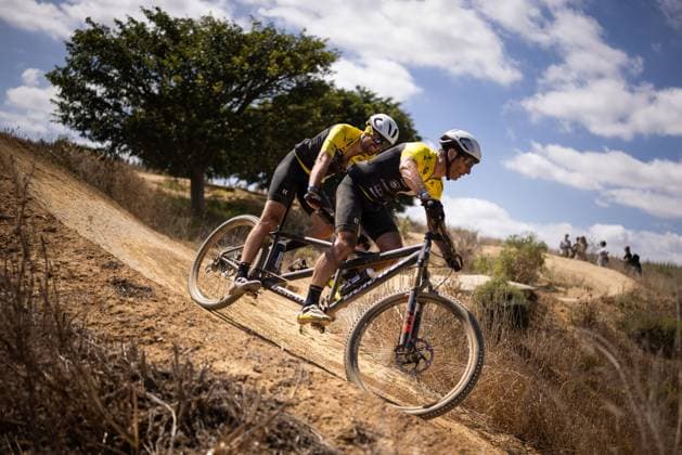 Blind biker Ondrej Zmeskal with his driver Mark Peterka on the course of the opening prologue of the seven-day Cape Epic mountain bike pairs stage race in South Africa, March 16, 2025. (CTKxPhoto MichalxCerveny) CTKPhotoF202503160023601  CTKPhotoF202503160023601