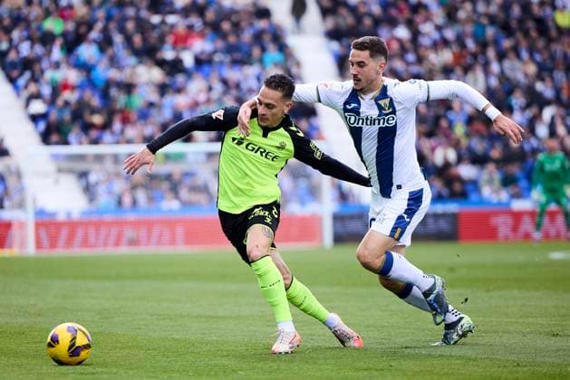 Antony Real Betis and Javier Hernandez CD Leganes battle for the ball during the LaLiga match between CD Leganís and Real Betis at Butarque on March 16, 2025 in Leganís, Spain Photo by Manu Reino DeFodi Images