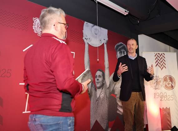 18 03 2025 Soccer 1 FC Nuremberg FCN Club Kick Off event for the 125th anniversary of 1 FC Nuremberg Sportfoto Zink DaMa xdaxmax Daniell Westgate Team 125 Jahre Organistaion 1 FC Nuremberg FCN Niels Rossow Board Member Strategy Marketing 1 FC Nuremberg FCN speaking to guests