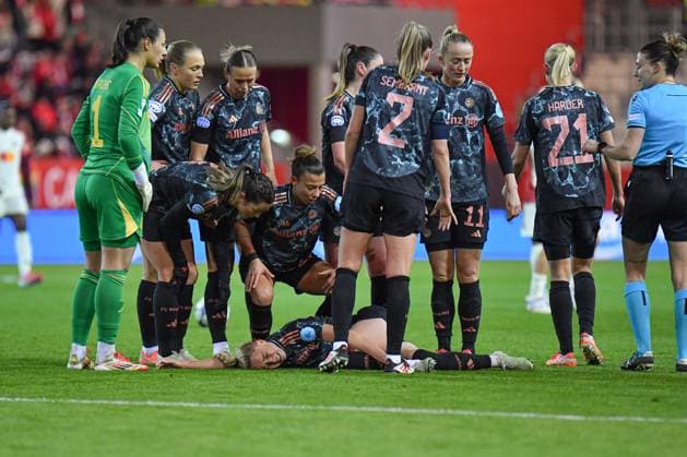 Giulia Gwinn 7 FC Bayern after a foul on the ground during the UEFA Womens Champions League match FC Bayern Munich Olympique Lyon on 18 03 2025 Munich FC Bayern Campus Bayern Germany