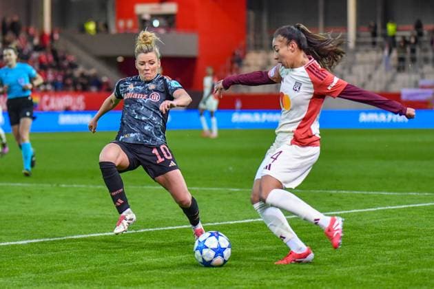 Linda Dallmann 10 FC Bayern and Selma Bacha 4 Olympique Lyonnais in action at the UEFA Womens Champions League match FC Bayern Munich Olympique Lyon on 18 03 2025 Munich FC Bayern Campus Bayern Germany
