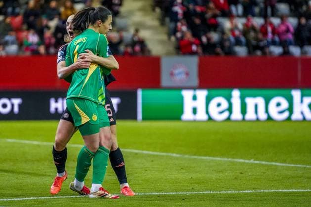 Glodis Viggosdottir 4 FC Bayern hugs Maria Luisa Grohs 1 Bayern after scoring the penalty during the UEFA Womens Champions League match FC Bayern Munich Olympique Lyon on 18 03 2025 Munich FC Bayern Campus Bayern Germany