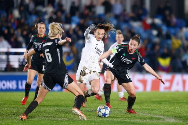 March 18, 2025, Valdebebas, Madrid, SPAIN: Caroline Weir of Real Madrid and Kim Little of Arsenal FC in action during the UEFA WomenÃ¢â‚¬â ¢s Champions League Quarter Final first leg, football match played between Real Madrid CF and Arsenal FC at Alfredo Di Stefano stadium on March 18, 2025, in Valdebebas, Madrid, Spain. Valdebebas SPAIN - ZUMAa181 20250318_zaa_a181_126 Copyright: xDennisxAgyemanx