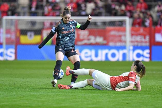 Sarah Zadrazil 25 FC Bayern and Damaris Egurrola 13 Olympique Lyonnais in action at the UEFA Womens Champions League match FC Bayern Munich Olympique Lyon on 18 03 2025 Munich FC Bayern Campus Bayern Germany