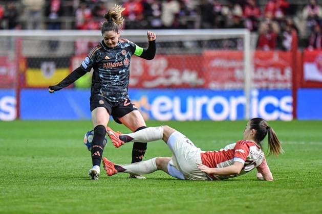 Sarah Zadrazil 25 FC Bayern and Damaris Egurrola 13 Olympique Lyonnais in action at the UEFA Womens Champions League match FC Bayern Munich Olympique Lyon on 18 03 2025 Munich FC Bayern Campus Bayern Germany