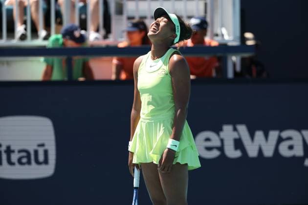 March 18, 2025, Miami Gardens, Florida, United States Of America: MIAMI GARDENS, FLORIDA - MARCH 18: Naomi Osaka of Japan defeats Yuliia Starodubtseva of the Ukraine during their match on Day 1 of the Miami Open at Hard Rock Stadium on March 18, 2025 in Miami Gardens, Florida. ...People: Naomi Osaka Miami Open Presented by Itau 2025 - Day 1  - ZUMAs214 20250318_ada_s214_030 Copyright: xSMGx