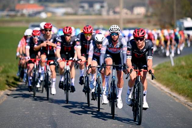 Danilith Nokere Koerse 2025 cycling race NOKERE, BELGIUM - MARCH 19 : rider of Tudor Pro Cycling Team and rider of Alpecin-Deceuninck during the Men Elite UCI 1.Pro 78th Danilith Nokere Koerse cycling race with start in Deinze and finish in Nokere (188,2 km) on March 19, 2025 in Nokere, Belgium, 19 03 2025 ( Motordriver Rodrique Verfaillie & Nokere Belgium  Copyright: xTomasxSiskx